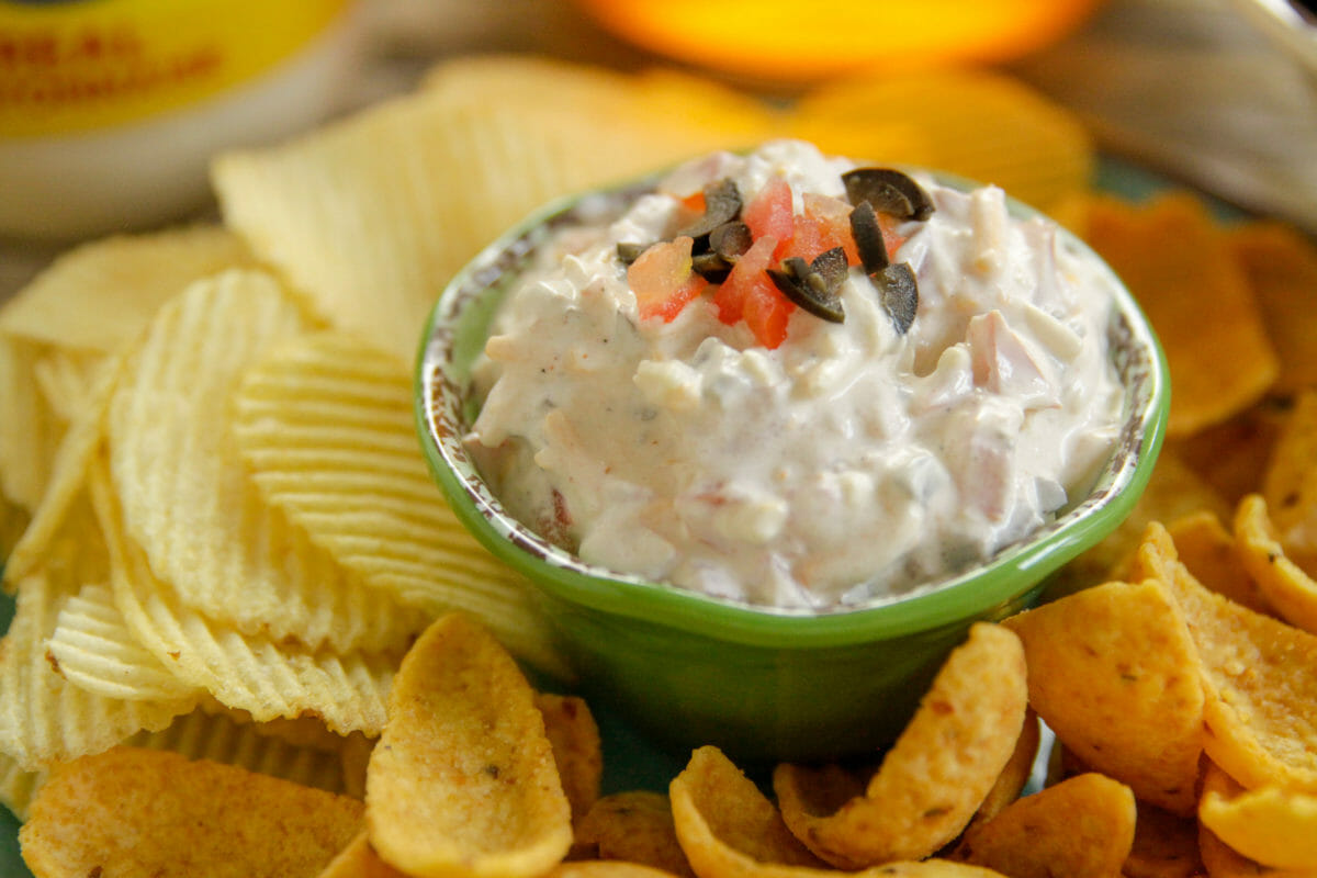 Kickoff Chip Dip in a serving dish with chips on the side