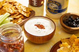 recipe image Kickoff Chip Dip in wooden bowl