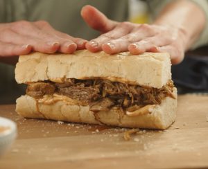 Cochon De Lait PoBoy sandwich on classic sliced New Orleans French Bread 