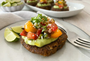 Black Bean Cake topped with avocado and salsa