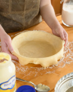 Pie crust made with Blue Plate Mayonnaise, placed in a round pie dish