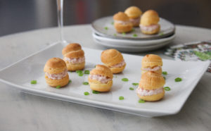 Bite-size Ham Mouse Puffs arranged on a serving platter