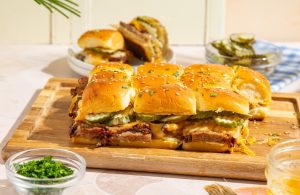 brisket sliders on cutting board