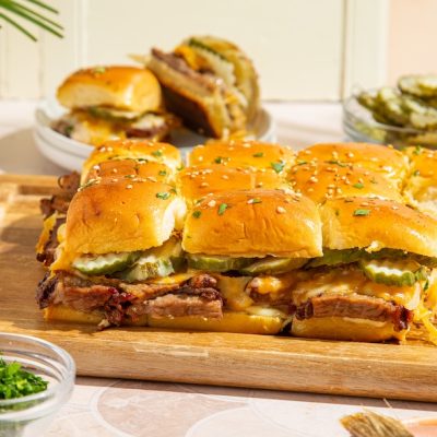 brisket sliders on cutting board