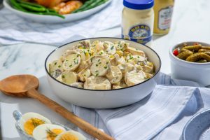 Creamy french remoulade potato salad in a serving bowl