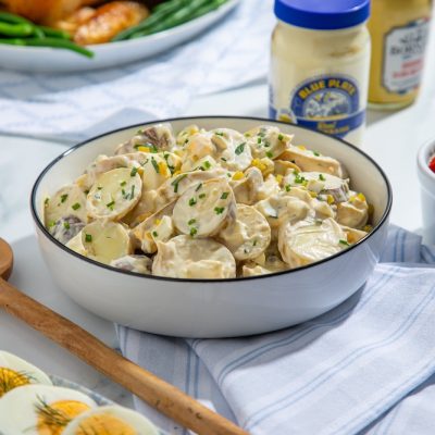 Creamy french remoulade potato salad in a serving bowl
